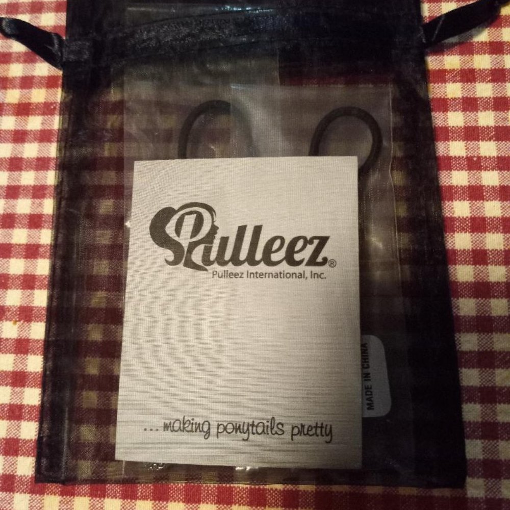 Brand New Pulleeze Hair Ties. Includes 2.